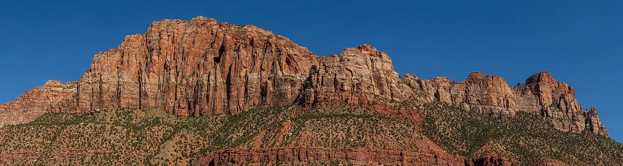 A panorama of red sandstone cliffs above Springdale, Utah.